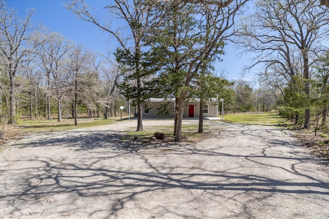 view of road with driveway