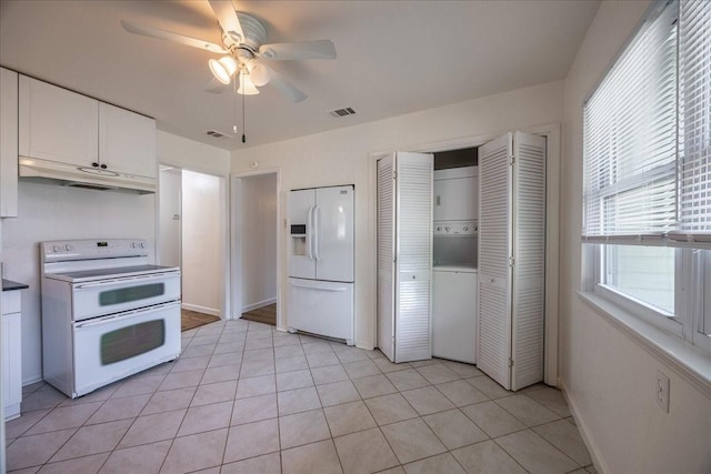 1602 Marion Dr, Garland, TX 75042 - kitchen with a ceiling fan, white appliances, under cabinet range hood, visible vents, and white cabinets