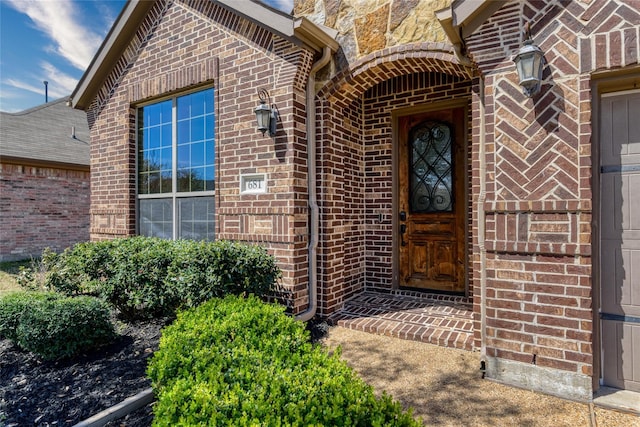 681 Harper Dr, Fate, TX 75087 - view of exterior entry with brick siding