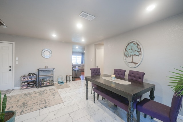 dining area featuring marble finish floor, baseboards, visible vents, and recessed lighting