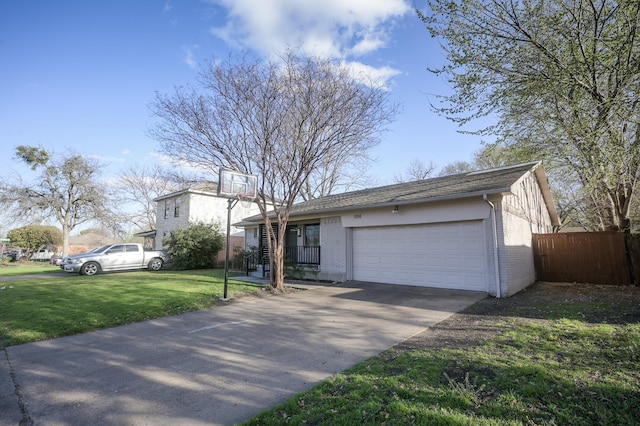 view of front facade with driveway, a front yard, fence, brick siding, and a garage