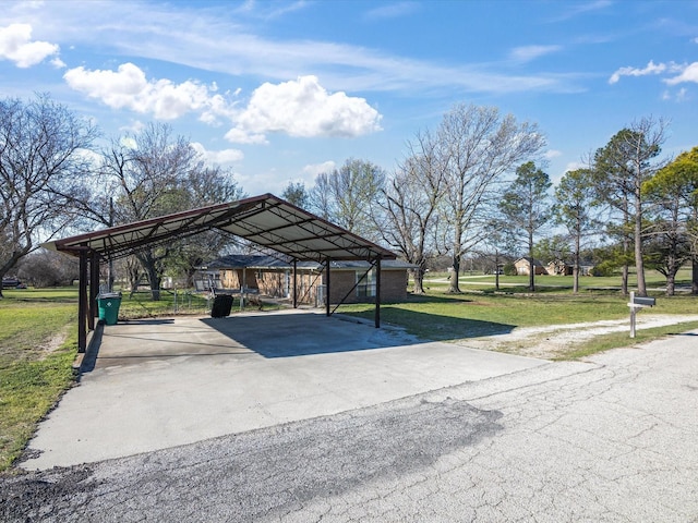 175 Clover Ln, Decatur, TX 76234 - view of vehicle parking featuring a detached carport