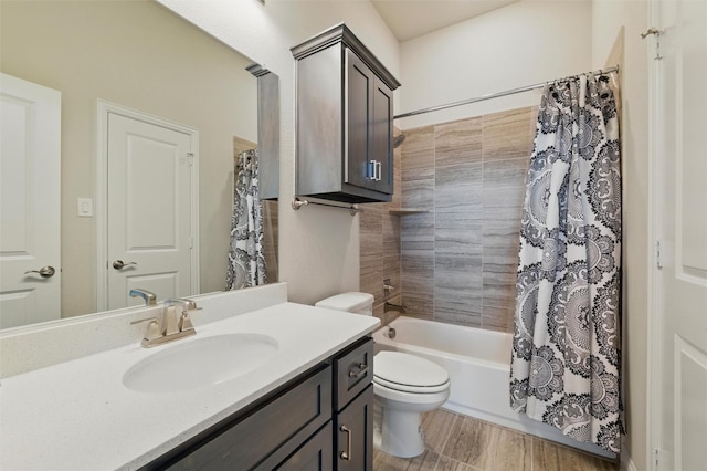 bathroom featuring wood finished floors, toilet, vanity, and shower / bathtub combination with curtain
