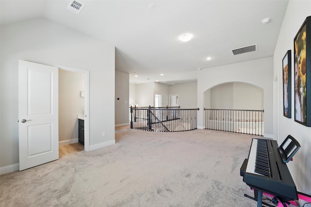 interior space with baseboards, visible vents, and carpet floors