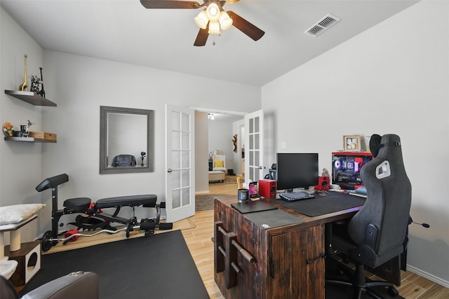 6028 Bowie Ct, Providence Village, TX 76227 - office with french doors, light wood-style flooring, a ceiling fan, and baseboards