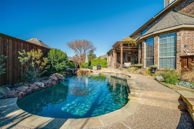 990 Willowmist Dr, Prosper, TX 75078 - view of pool featuring fence, a pool with connected hot tub, and a patio area