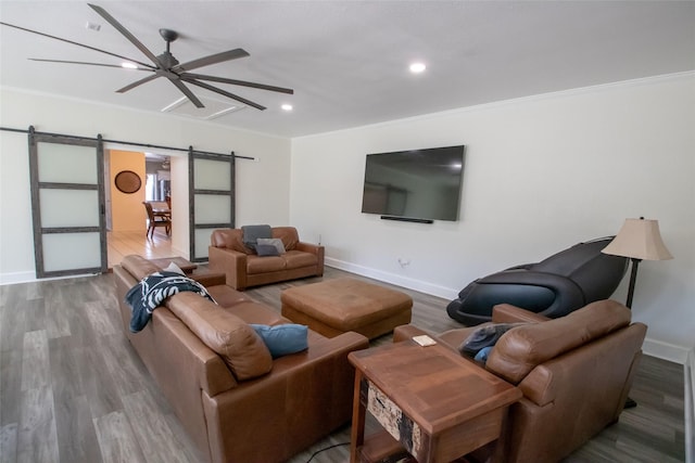 514 Preston Dr, Pottsboro, TX 75076 - living room featuring baseboards, a barn door, wood finished floors, and a ceiling fan