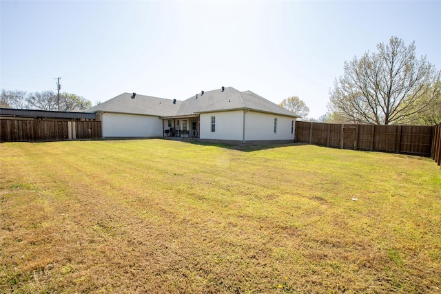 514 Preston Dr, Pottsboro, TX 75076 - back of property featuring a lawn and a fenced backyard