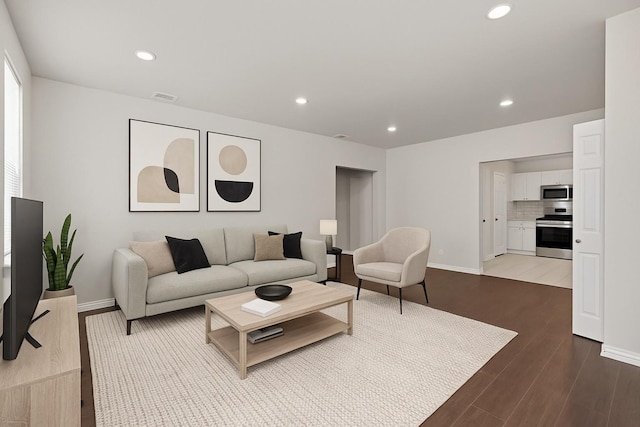 4601 Virginia Ln, Fort Worth, TX 76103 - living room featuring baseboards, dark wood finished floors, and recessed lighting