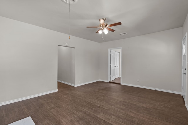 4601 Virginia Ln, Fort Worth, TX 76103 - empty room with ceiling fan, dark wood-style floors, and baseboards