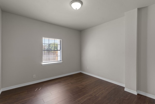 4601 Virginia Ln, Fort Worth, TX 76103 - empty room with dark wood-type flooring and baseboards