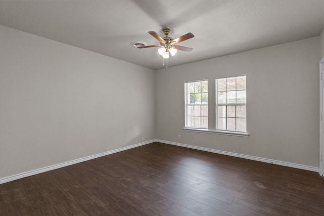 4601 Virginia Ln, Fort Worth, TX 76103 - unfurnished room with ceiling fan, dark wood-style floors, and baseboards