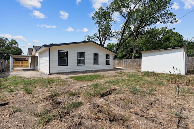 4601 Virginia Ln, Fort Worth, TX 76103 - back of house featuring an outbuilding