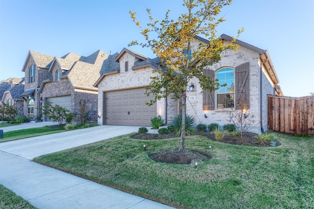 1916 Pelham Dr, Aubrey, TX 76227 - french country style house with a garage, driveway, and brick siding