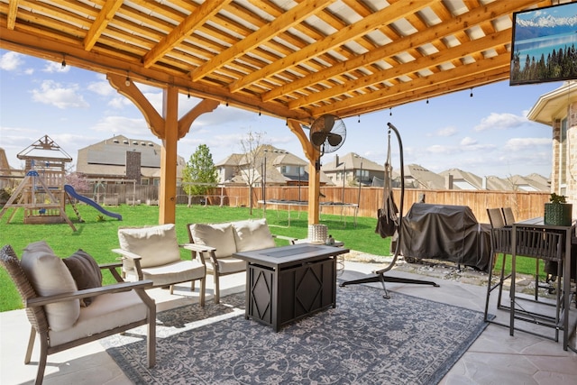 4600 Periwinkle Dr, Mansfield, TX 76063 - view of patio featuring a trampoline, a playground, a grill, and a residential view