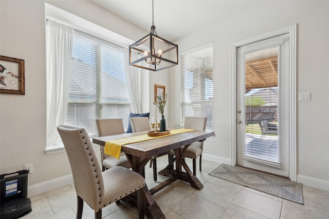 4600 Periwinkle Dr, Mansfield, TX 76063 - dining room featuring a chandelier, baseboards, and light tile patterned floors
