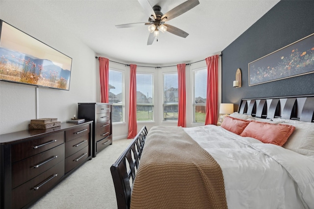 4600 Periwinkle Dr, Mansfield, TX 76063 - bedroom featuring light colored carpet, multiple windows, and a ceiling fan