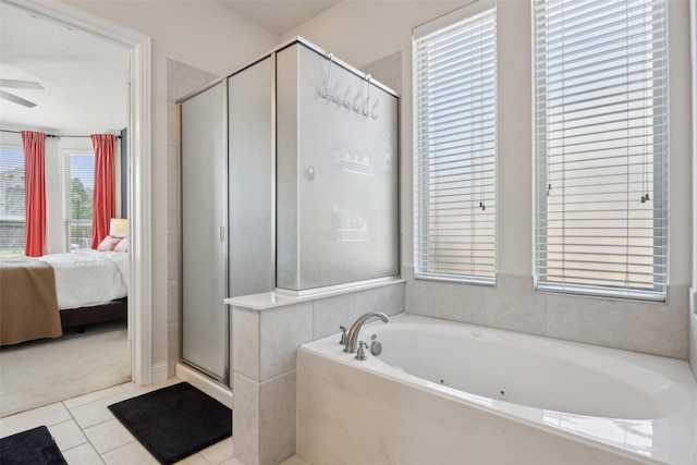 4600 Periwinkle Dr, Mansfield, TX 76063 - full bath featuring ensuite bath, a shower stall, a whirlpool tub, tile patterned floors, and a ceiling fan