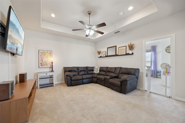 4600 Periwinkle Dr, Mansfield, TX 76063 - living room featuring ceiling fan, a tray ceiling, light colored carpet, recessed lighting, and baseboards