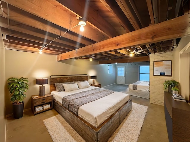 bedroom with concrete floors