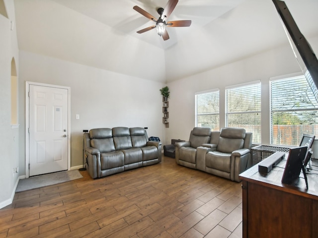 4013 Hollow Lake Rd, Fort Worth, TX 76262 - living area with ceiling fan, wood finished floors, vaulted ceiling, and arched walkways