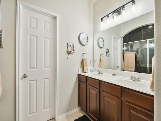 4013 Hollow Lake Rd, Fort Worth, TX 76262 - full bathroom featuring double vanity, a shower stall, and tile patterned flooring