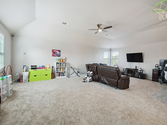 4013 Hollow Lake Rd, Fort Worth, TX 76262 - carpeted living room featuring a ceiling fan and vaulted ceiling