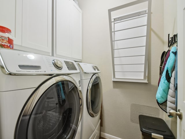4013 Hollow Lake Rd, Fort Worth, TX 76262 - laundry area with washing machine and dryer, cabinet space, and baseboards