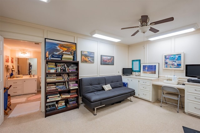 138 Hideaway Ln E, Hideaway, TX 75771 - home office with light carpet, a decorative wall, and a ceiling fan