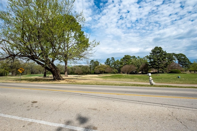 138 Hideaway Ln E, Hideaway, TX 75771 - view of road featuring traffic signs