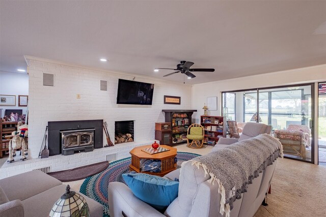138 Hideaway Ln E, Hideaway, TX 75771 - carpeted living room with visible vents, a fireplace, a ceiling fan, and recessed lighting