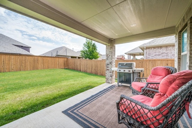 view of patio / terrace featuring grilling area and a fenced backyard