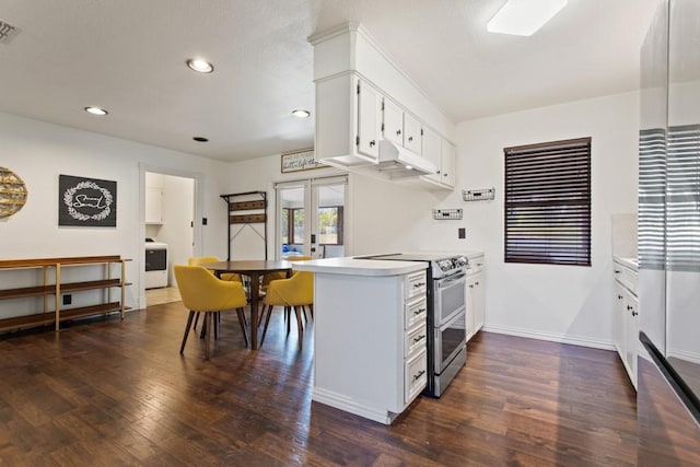 kitchen with french doors, dark wood-type flooring, electric stove, washer / clothes dryer, and white cabinets