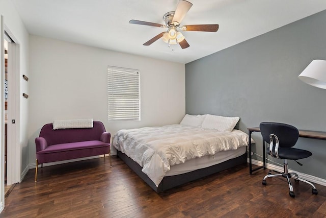 bedroom with baseboards, wood finished floors, and a ceiling fan