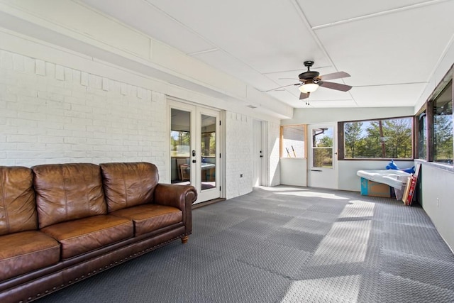 sunroom featuring french doors
