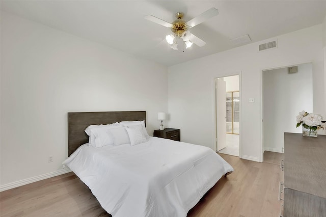 1700 Amelia Ct Unit 312, Plano, TX 75075 - bedroom with light wood-style flooring, baseboards, and a ceiling fan