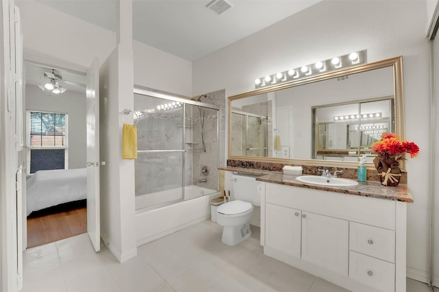1700 Amelia Ct Unit 312, Plano, TX 75075 - full bath with toilet, vanity, and shower / bath combination with glass door