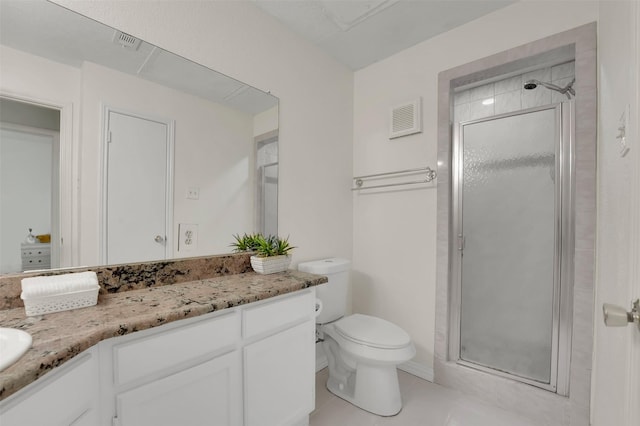 1700 Amelia Ct Unit 312, Plano, TX 75075 - bathroom featuring a shower stall, vanity, toilet, and tile patterned floors