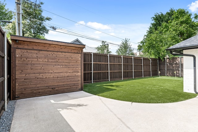4527 Elsby Ave, Dallas, TX 75209 - view of yard featuring a patio area and driveway