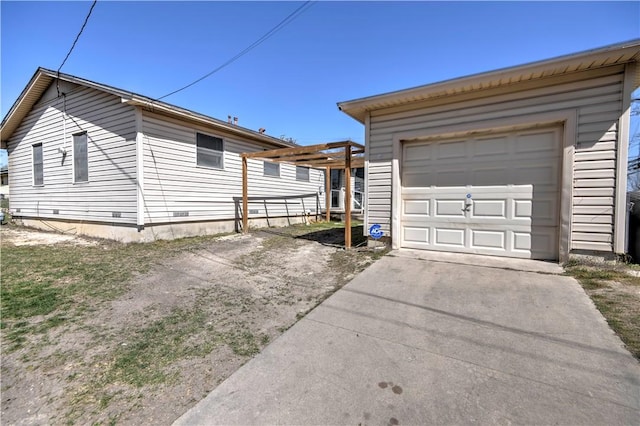 exterior space with concrete driveway