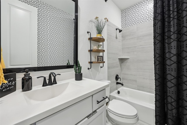 full bath with shower / bath combination with curtain, toilet, and vanity