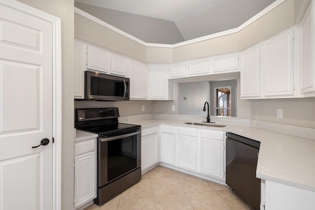 kitchen featuring vaulted ceiling, white cabinetry, a sink, black appliances, and light tile patterned flooring