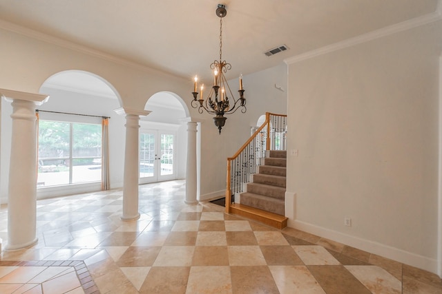interior space with visible vents, arched walkways, ornamental molding, and decorative columns