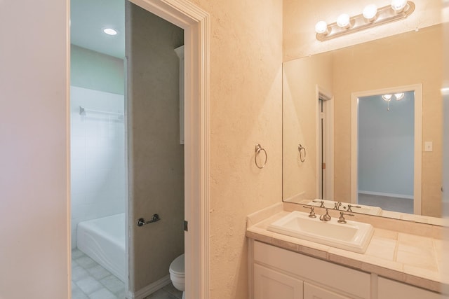 full bathroom with vanity and toilet