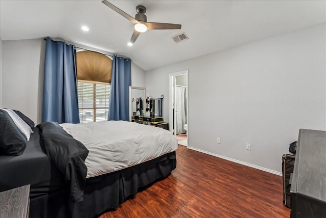 bedroom with a ceiling fan, wood finished floors, lofted ceiling, baseboards, and visible vents