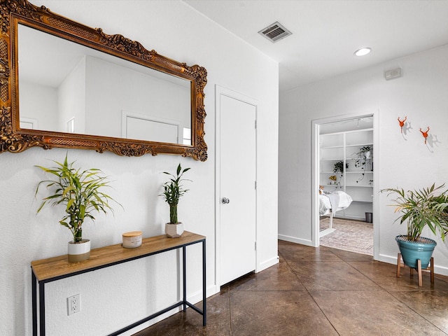 4011 Appian Way, Arlington, TX 76013 - hall featuring concrete floors, baseboards, and recessed lighting