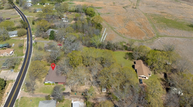 birds eye view of property featuring a rural view