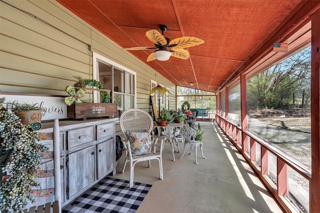 view of patio featuring a ceiling fan