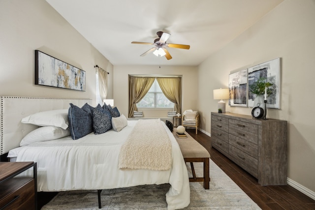 9721 Stripling Dr, Fort Worth, TX 76244 - bedroom with baseboards, dark wood-type flooring, and ceiling fan