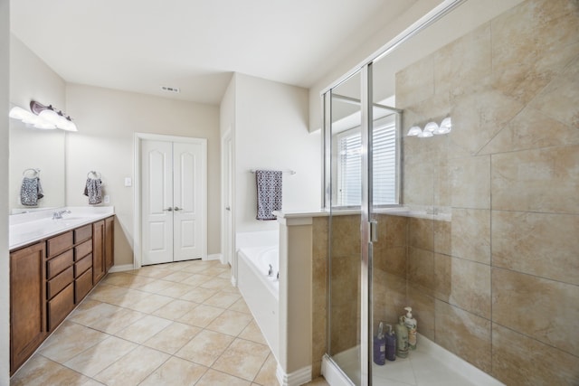 9721 Stripling Dr, Fort Worth, TX 76244 - bathroom with vanity, a garden tub, a stall shower, and tile patterned flooring